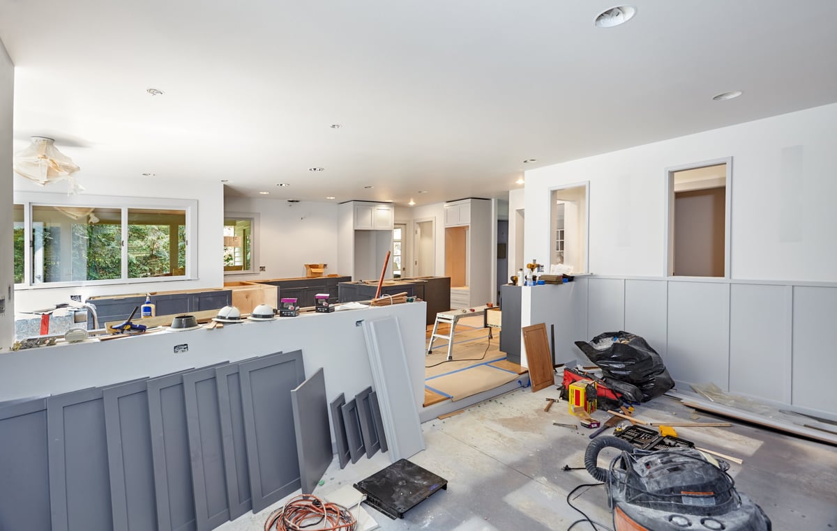 Cabinet doors, shelves and tools laid out during an extensive property restoration